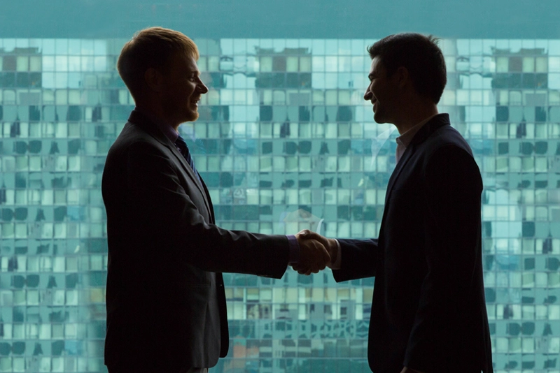 Business merger handshake